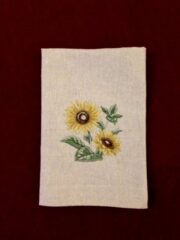 A Sunflowers Embroidered Osnaburg Towel.