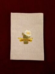 A white cloth with an "Arizona Saguaro" embroidered on it.
