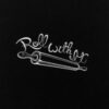 Roll with it logo on a "Lick The Spoon" background.