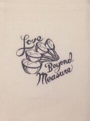 Love Beyond Measure" tea towel.