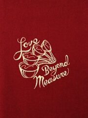 A red towel with the words "Love Beyond Measure" on it.