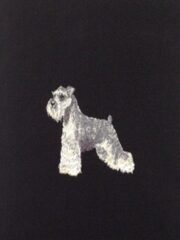A Schnauzer dog is embroidered on a black background.