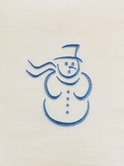 A white napkin with a Snowman (Blue) on it.