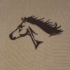 A horse head on a tan background.